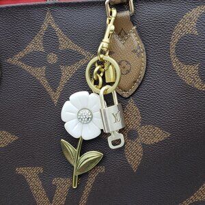 Authentic Louis Vuitton Lock & Key with Unbranded Flower Charm, Keychain